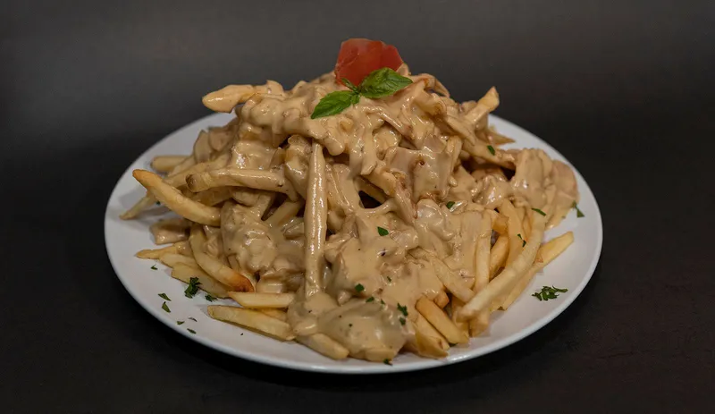 Papas Fritas con Crema Champiñon